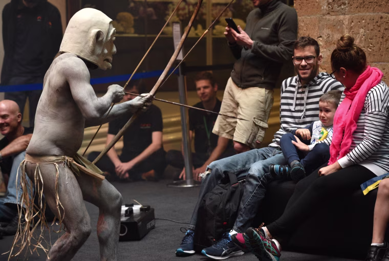 Image: Asaro Mud Men perform at the Australian Museum in Sydney