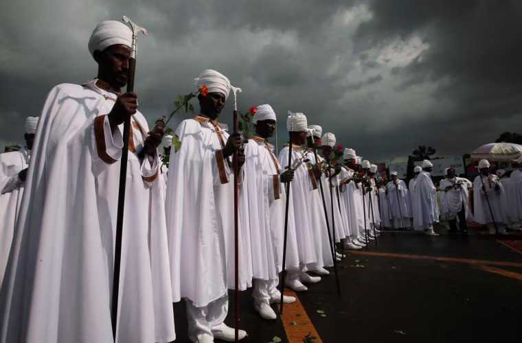 Image: A church choir performs during the Meskel Festival to commemorate the discovery of the true cross on which Jesus Christ was crucified on at the Meskel Square in Ethiopia's capital Addis Ababa