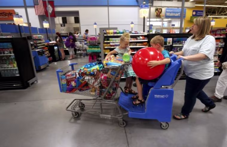 A family shops at the Wal-Mart Supercenter in Springdale