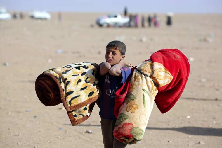 Image: TOPSHOT-SYRIA-IRAQ-CONFLICT-REFUGEES