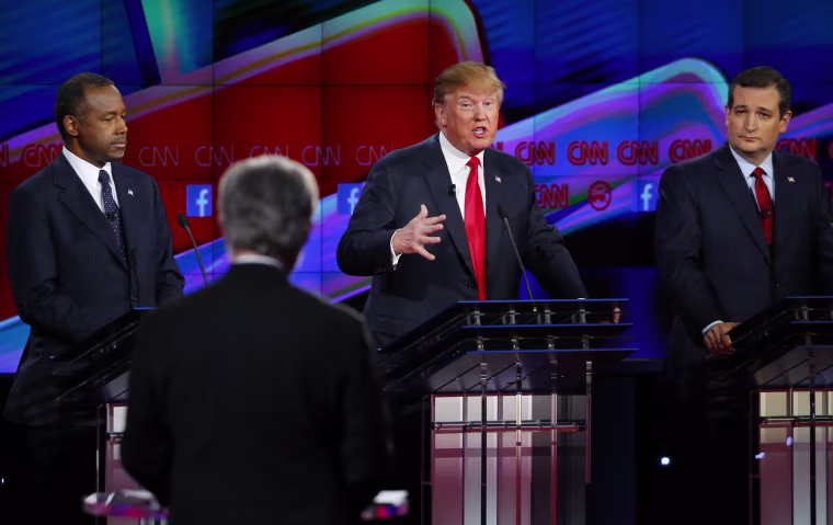 Image: Republican U.S. presidential candidate businessman Trump responds to a question from moderator Blitzer as Carson and Cruz look on during the Republican presidential debate in Las Vegas