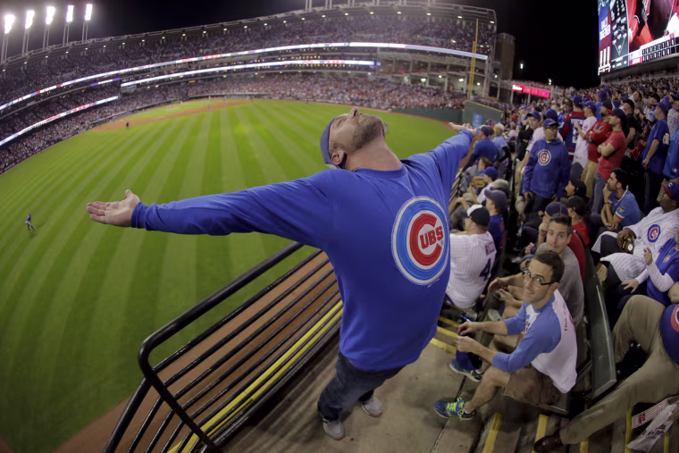 Image: A Chicago Cubs celebrates during the eighth inning of Game 7 of the Major League Baseball World Series against the Cleveland Indians