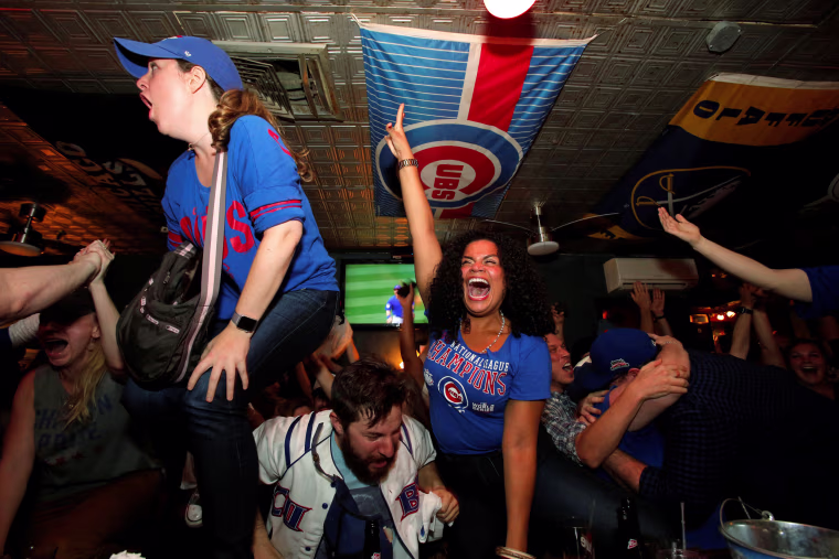 Image: Fans of National League baseball team Chicago Cubs gathered to watch the game at Kelly's bar celebrate their Major League Baseball World Series game 7 victory against American League's Cleveland Indians in Manhattan, New York U.S.