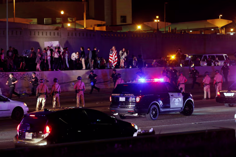 Image: Demonstrators take over the Hollywood 101 Freeway in protest against the election of Republican Donald Trump as President of the United States in Los Angeles, California