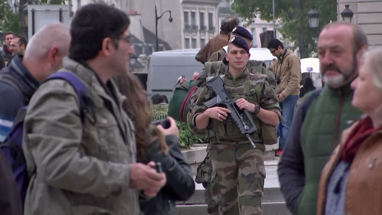 Soldiers and security forces are now a bigger presence in Paris a year after the terror attacks.