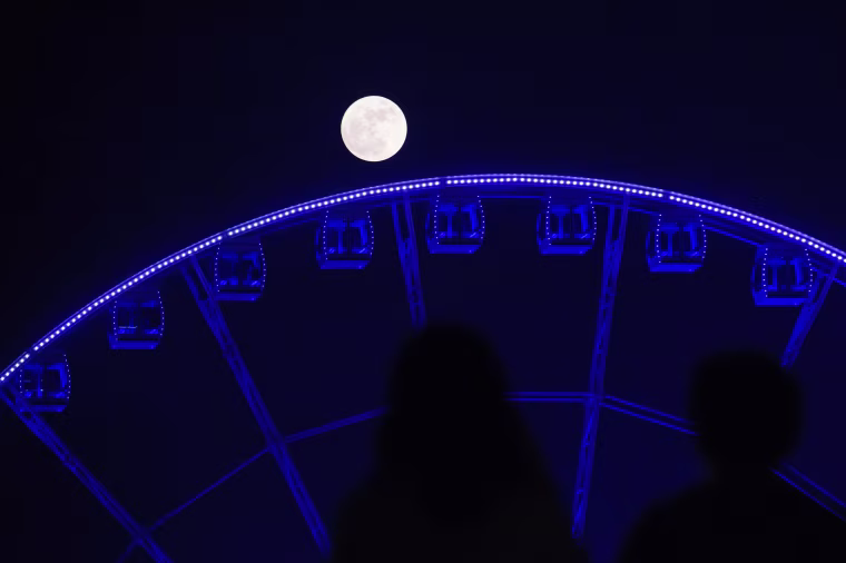 Image: HONG KONG-SCIENCE-ASTRONOMY-MOON-PHENOMENON