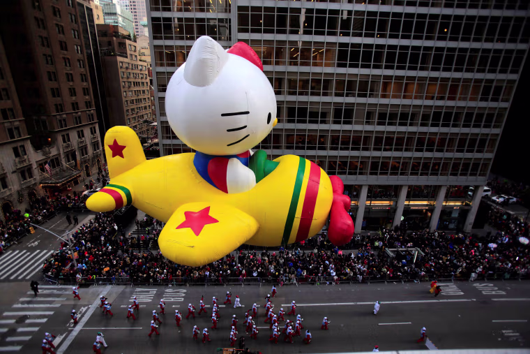 Image: A Hello Kitty float makes its way down 6th Avenue during the 90th Macy's Thanksgiving Day Parade in the Manhattan borough of New York
