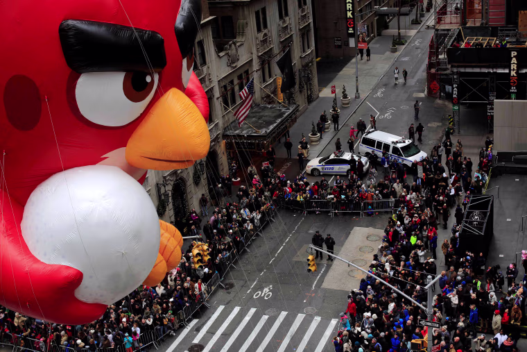 Image: An Angry Bird float makes its way down 6th Avenue during the 90th Macy's Thanksgiving Day Parade in the Manhattan borough of New York