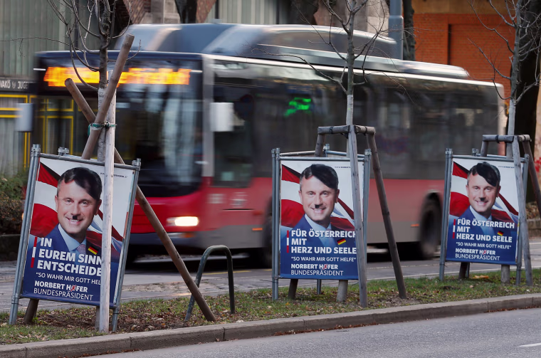 Image: Defaced election campaign posters of far-right FPOe candidate Norbert Hofer