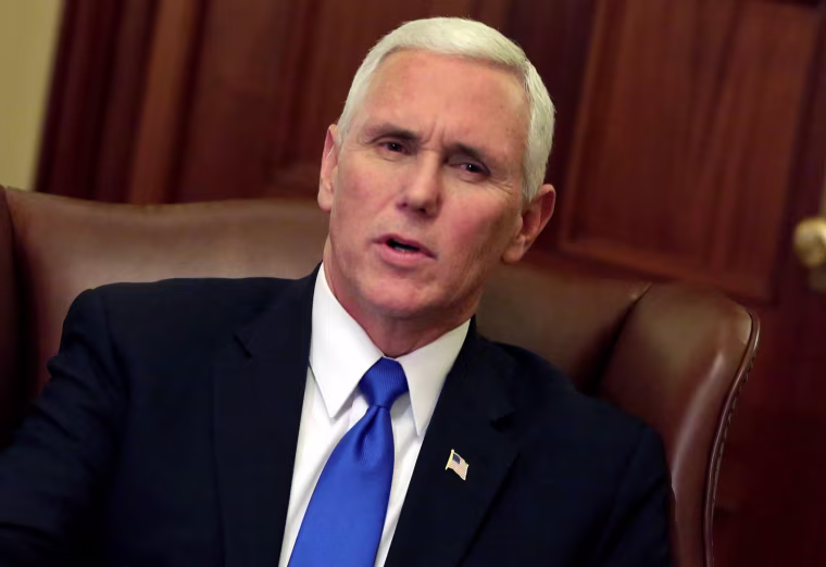 Image: Vice President-elect Mike Pence speaks during a meeting with House Speaker Paul Ryan on Capitol Hill in Washington, D.C. on Nov. 30.
