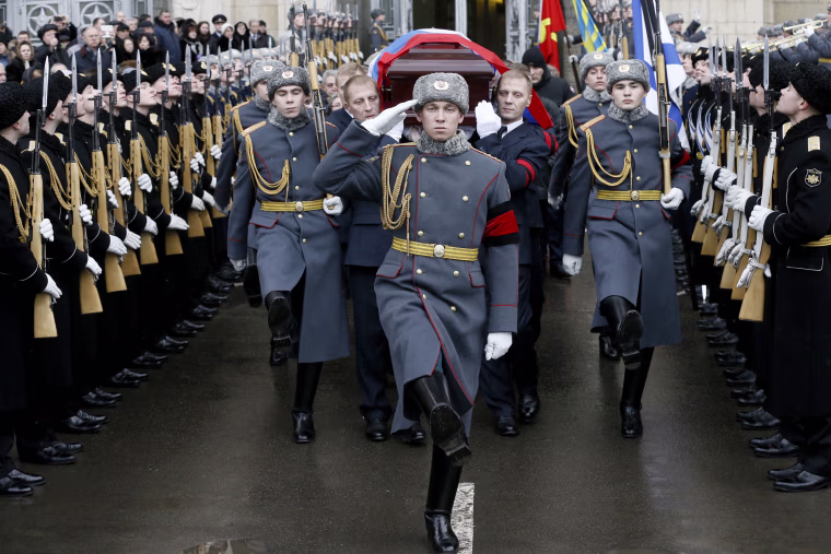 Image: Russian servicemen carry a coffin with the body of the Russian Ambassador to Turkey Andrei Karlov after a farewell ceremony at the offices of the Russian Foreign Ministry, Dec. 22.
