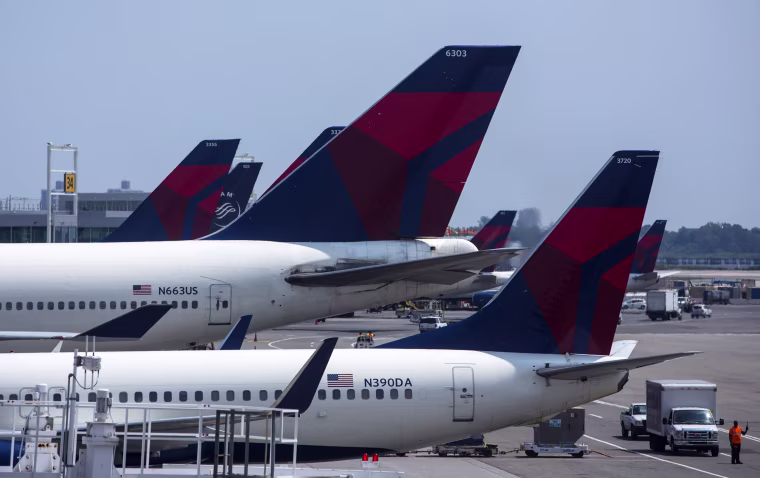 Image: Delta Airlines planes sit at Terminal 4 at John F. Kennedy Airport
