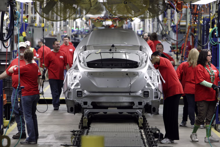 Image: Ford Focus vehicles are assembled at the Michigan Assembly Plant in Wayne, Michigan on March 17, 2011.