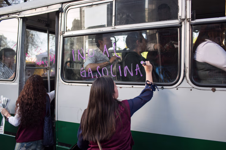 Image: People attach signs to cars protesting an increase in gas prices during a protest organized by the Morena Political party on Jan. 4 in Mexico City.