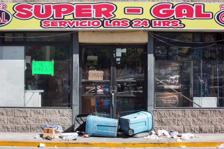 Image: A vandalized gas station sits abandoned following protests on Jan. 4 in Mexico City.