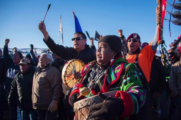 Image: Activists celebrate at Oceti Sakowin Camp on the edge of the Standing Rock Sioux Reservation on Dec. 4, 2016 outside Cannon Ball, North Dakota.