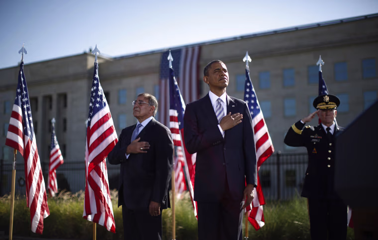 Image: U.S. President Obama, U.S. Secretary of Defense Panetta and Chairman of the Joint Chiefs of Staff Dempsey observe a moment of silence on the 11th anniversary of the 9/11 attacks at the Pentagon
