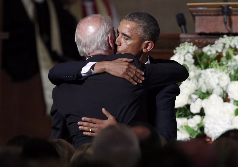 Image: U.S. President Obama kisses Vice President Biden on the cheek after delivering the eulogy during the funeral of Biden's son former Delaware Attorney General Beau Biden in Wilimington, Delaware