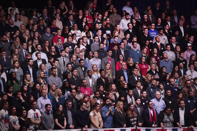 Image: Guests listen as President Obama delivers a farewell speech to the nation on Jan. 10 in Chicago, Illinois.