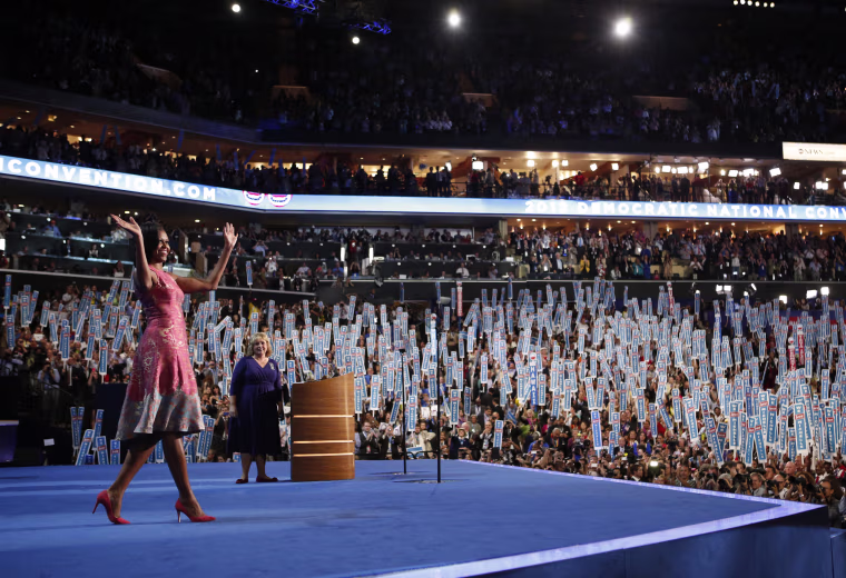 Image: First Lady Michelle Obama waves to delegates at the Democratic National Convention in Charlotte