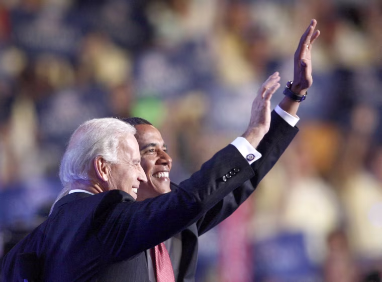 Image: Democratic presidential nominee U.S. Sen. Barack Obama and his vice presidential nominee U.S. Sen. Joe Biden wave to the crowd after Biden addressed the 2008 Democratic National Convention in Denver, Colorado, Aug. 27, 2008.