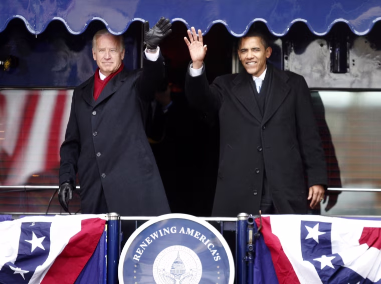 Image: U.S. President-elect Barack Obama is joined by U.S. Vice President-elect Joe Biden on the back of a train car during their whistle stop tour in Wilmington, Delaware, Jan. 17, 2009.