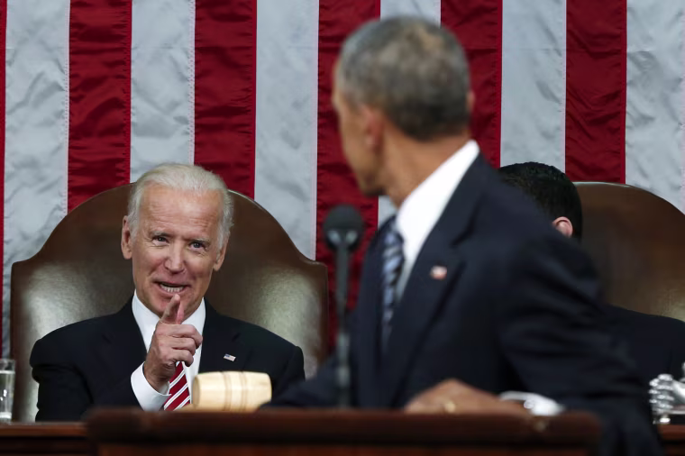 Image: Biden points to President Obama while Obama delivered his final State of the Union address to a joint session of Congress in Washington, Jan.12, 2016.