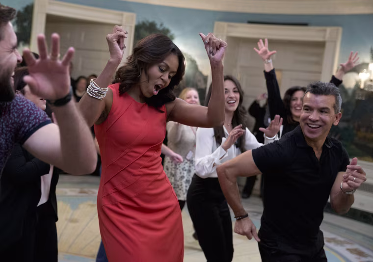 Image: Michelle Obama, Josh Segarra, Sergio Trujillo