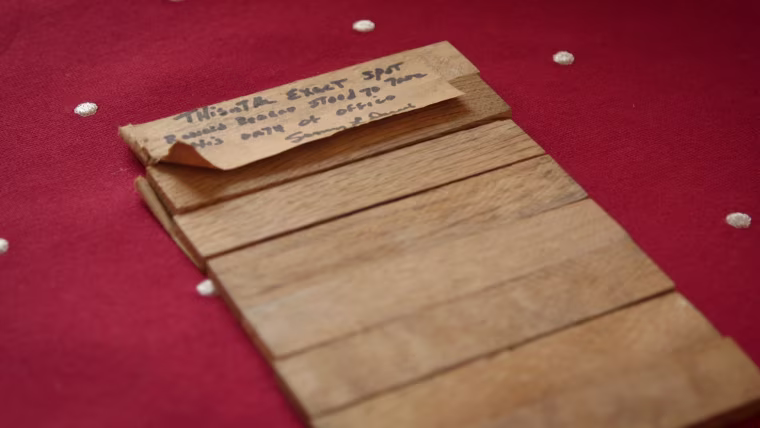 Sammy Lee Davis grabbed a wooden platform board taken from Ronald Reagan's first presidential inauguration in 1981.