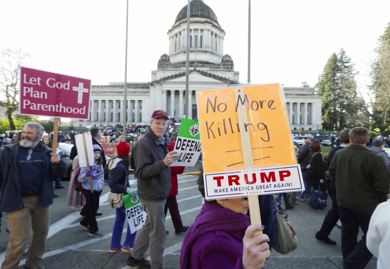 Image: People participate in an anti-abortion rally in Olympia, Wash.
