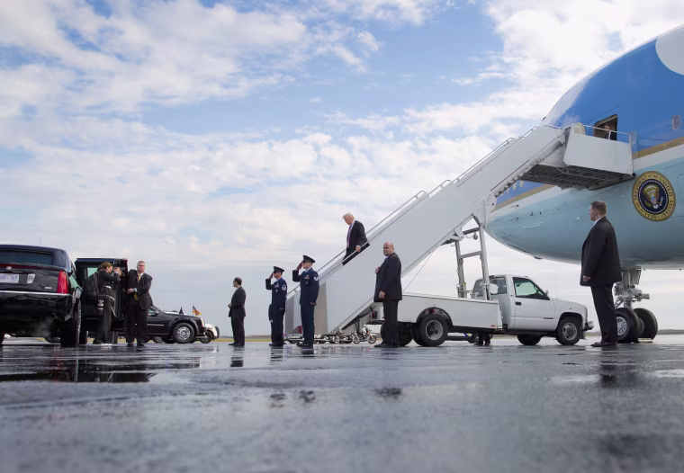 Image: President Donald Trump walks down the stairs of Air Force One upon he arrival at Philadelphia International Airport, Jan. 26, 2017.