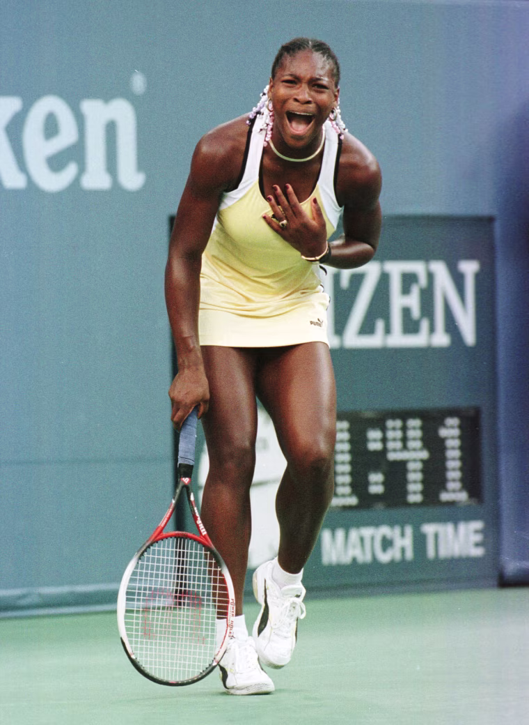 Image: 1999: Serena Williams, 17, celebrates her win over Martina Hingis of Switzerland in the women's final of the U.S. Open at the USTA National Tennis Center in Flushing Meadows, New York on Sept. 11. Williams defeated Hingis to win her first U.S. Open