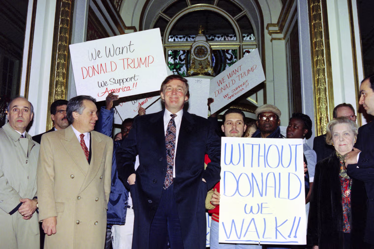 Image: Donald trump enters the Plaza Hotel past supporters in 1994
