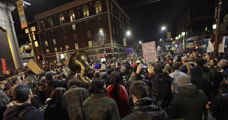 Image: Protesters against a scheduled speaking appearance by Breitbart News editor Milo Yiannopoulos