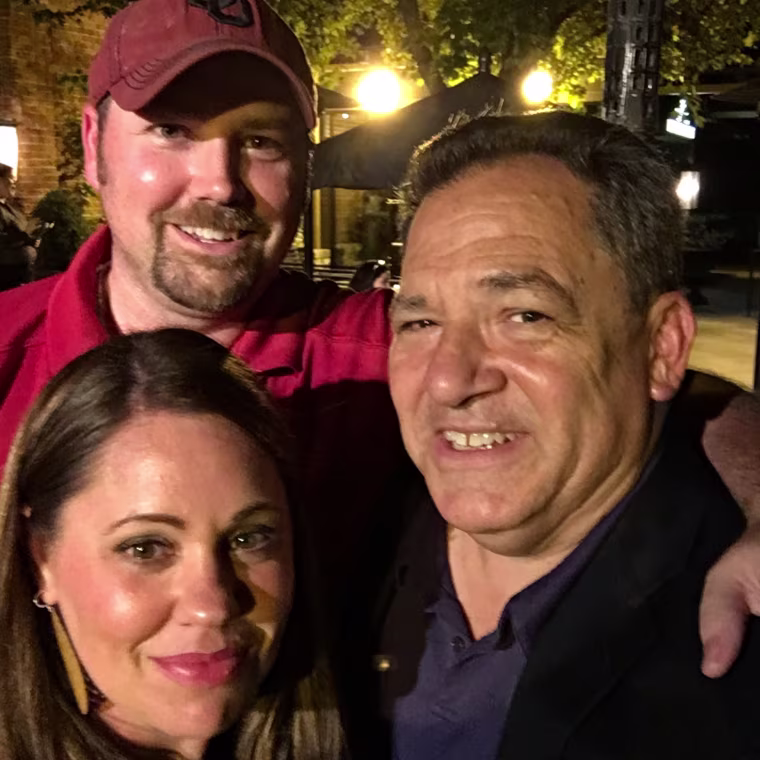 Melanie Hutchnson, her husband Brandon, and Josh Mankiewicz. 