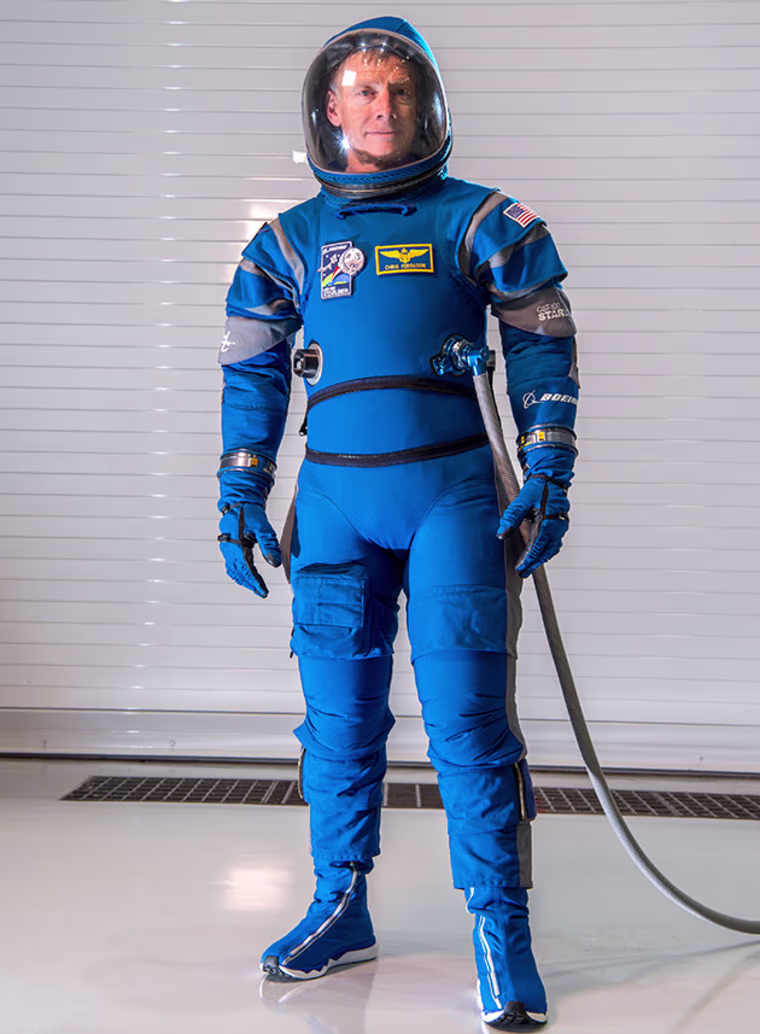 Former NASA astroanut Chris Ferguson, Boeing's director of Starliner Crew and Mission Systems, models the new spacesuit that passengers will wear aboard Boeing's Starliner spacecraft. According to NASA, the design is lighter and more comfortable than the spacesuits earlier astronauts wore. The Starliner is a next-generation space capsule that will take people to and from low-Earth orbit, including missions to the International Space Station.