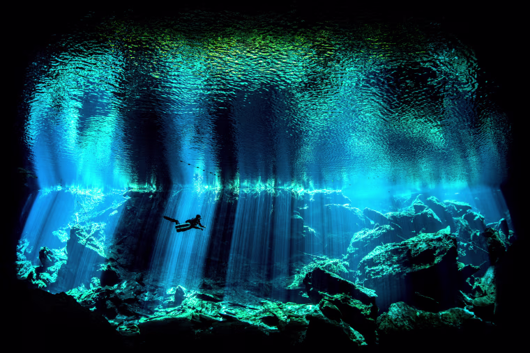 Image: Kukulkan Cenote on Mexico's Yucatan Peninsula forms part of the Chac Mool system and is noted for the spectacular light effects as the sun penetrates the darkness.