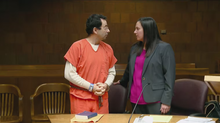 Image: Larry Nassar consults with his attorney before his arraignment in Ingham County court