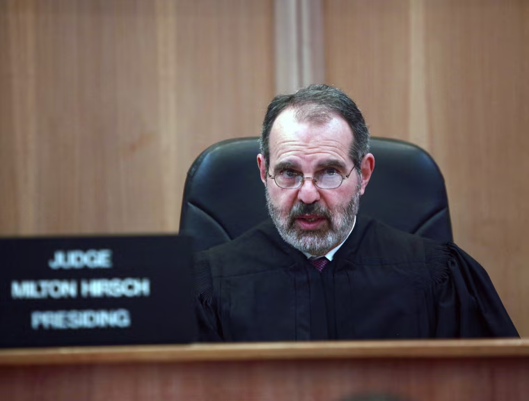 Image: Judge Milton Hirsch speaks at a hearing