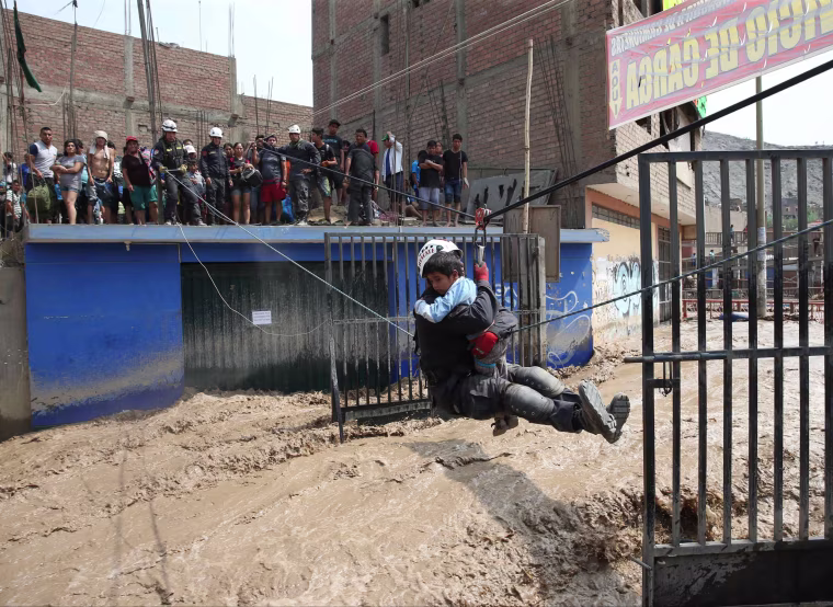 Image: Peruvian National Police rescue people trapped in buildings.
