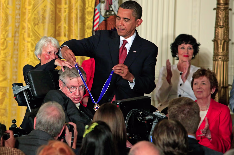 President Obama presents the Medal of Freedom to physicist Stephen Hawking in 2009.