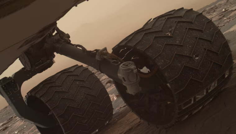 Two small breaks on the Curiosity rover's left middle wheel were discovered during a routine check, using the Mars Hand Lens Imager camera.