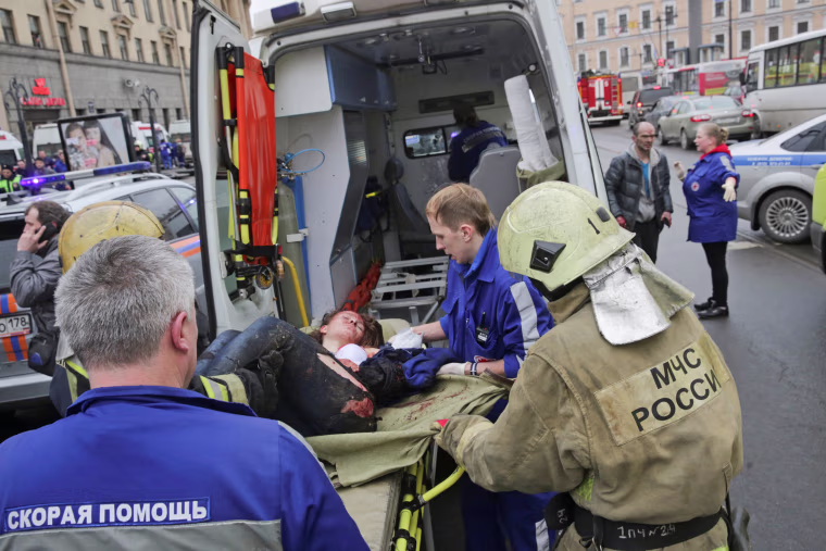 Image: An injured person is helped by emergency services