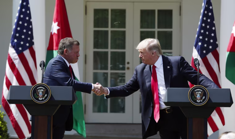 Image: U.S. President Trump greets Jordan's King Abdullah II during joint news conference at the White House in Washington