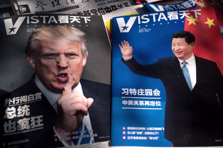 Image: Magazines featuring front pages of US President Donald Trump and China's President Xi Jinping