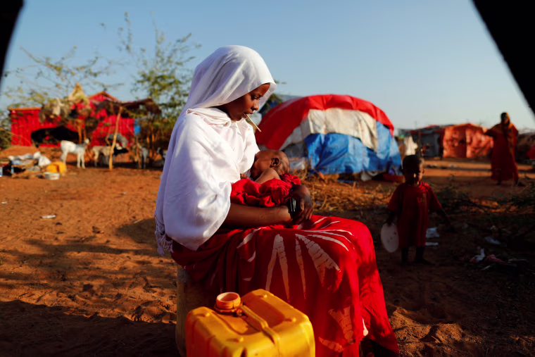 Image: The Wider Image: A daughter's freedom weighed against her siblings' lives