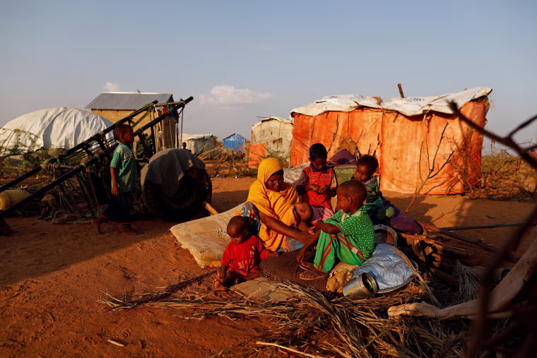 Image: The Wider Image: A daughter's freedom weighed against her siblings' lives