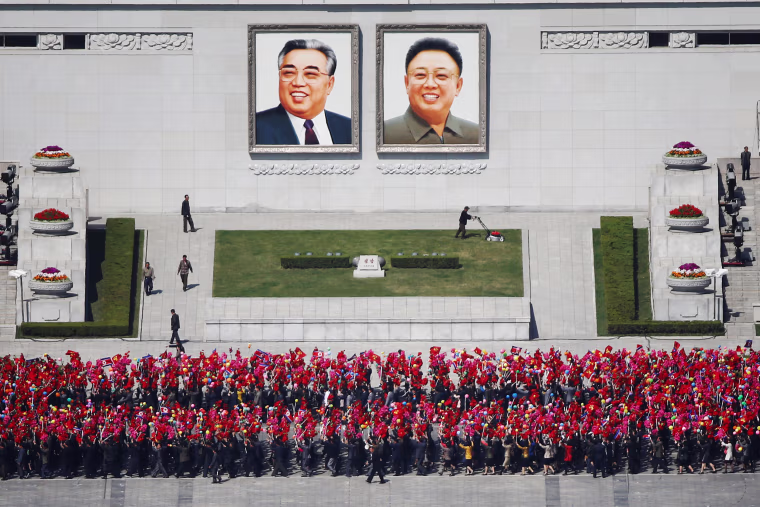 Image: People practice for the expected parade on the main Kim Il-Sung Square in central Pyongyang