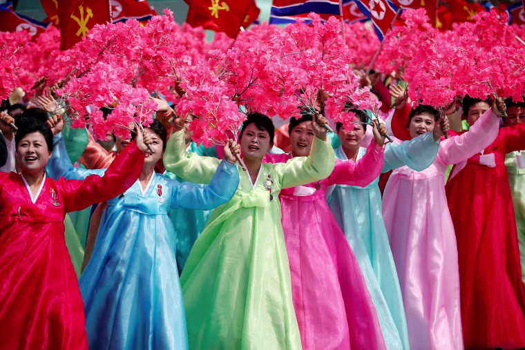 Image: Women wearing traditional clothes in Saturday's parade.ng