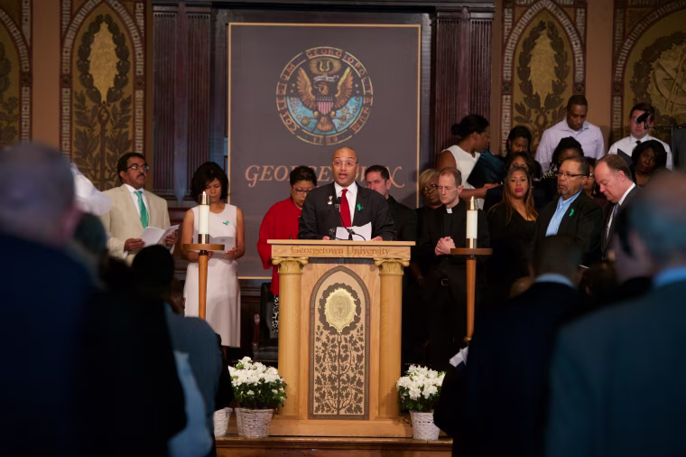 Mr. Jeremy Alexander, a descendant of the Mahoney family line and Georgetown staff member in the Office of Technology Commercialization, offers an intercession for hope at a Liturgy of Remembrance, Contrition, and Hope at Georgetown University.